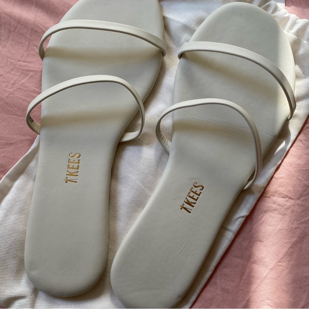 Brand new Tkees white strappy sandals.